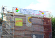 Riesiges Spruchband gegen B49-Neubau über dem Gießener Stadtfest